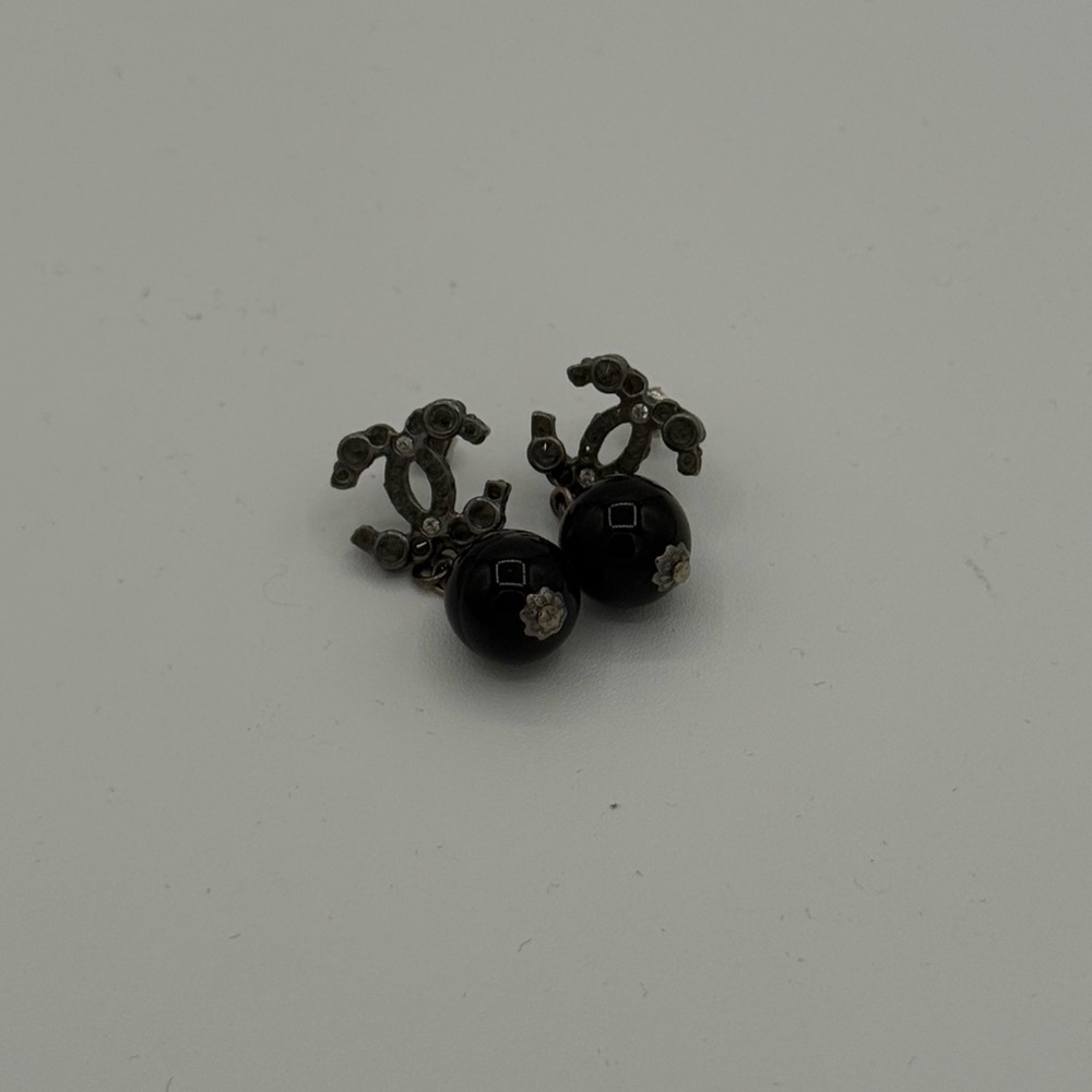 Black Stud Earrings with Decorative Accents